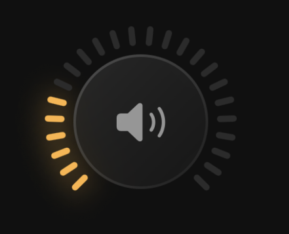 Tone's volume dial, a ring of marks lit amber to show the current level.